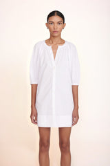 White mini dress with three-quarter puff sleeves and V-neck front buttons
