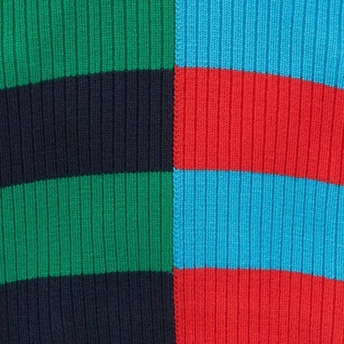 Close-up of multi-color cabana stripe knit on pet sweater fabric