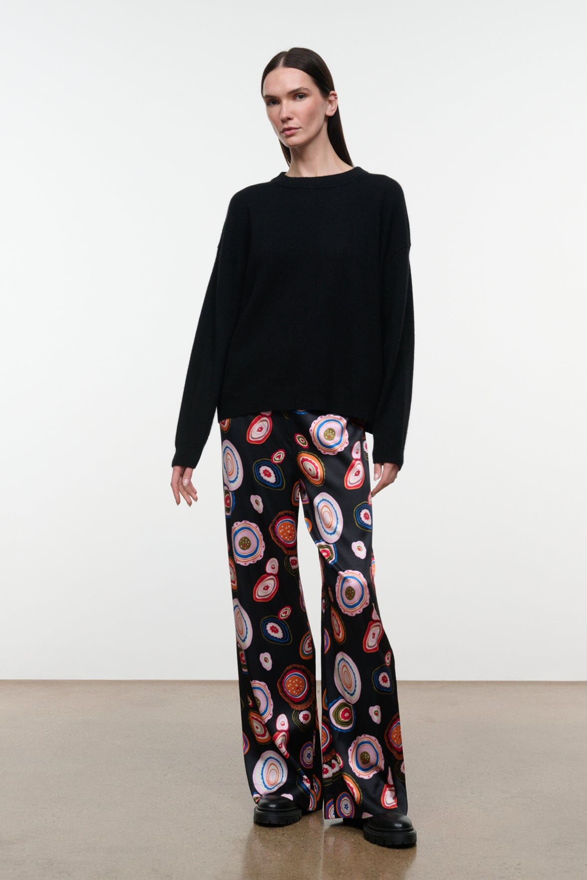 Silk pants in black with colorful circular paisley print, wide leg, pull-on style