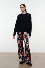 Silk pants in black with colorful circular paisley print, wide leg, pull-on style