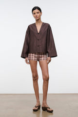 Dark brown silk dupioni top with V-neck and three toggle buttons, wide kimono sleeves