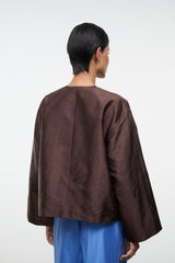 Back of dark brown silk dupioni top with center seam and kimono-style sleeves