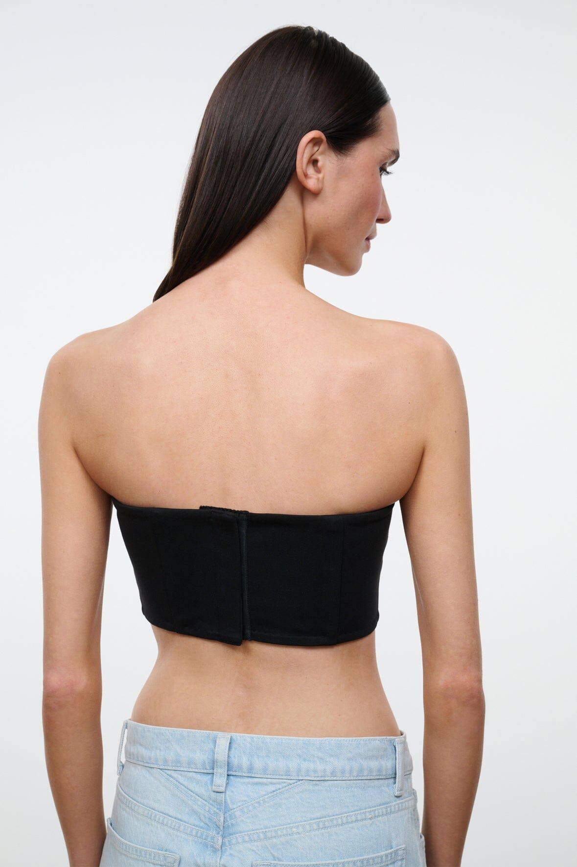 Black strapless tube top back view with center seam