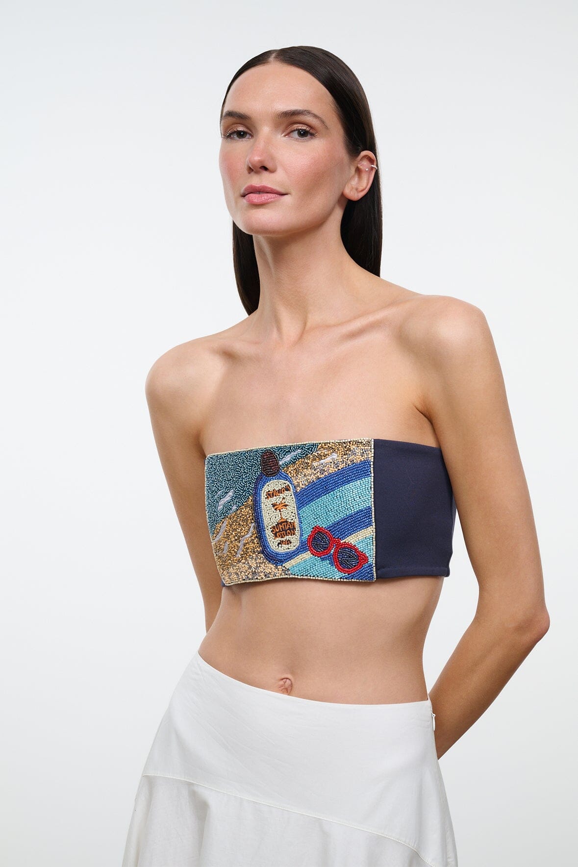 Bandeau tube top with navy band and colorful graphic patch detail