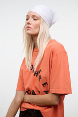 Ivory headscarf wrap cap with a neat fit around the forehead