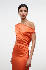 Orange silk maxi dress with one-shoulder drape and ruched waist