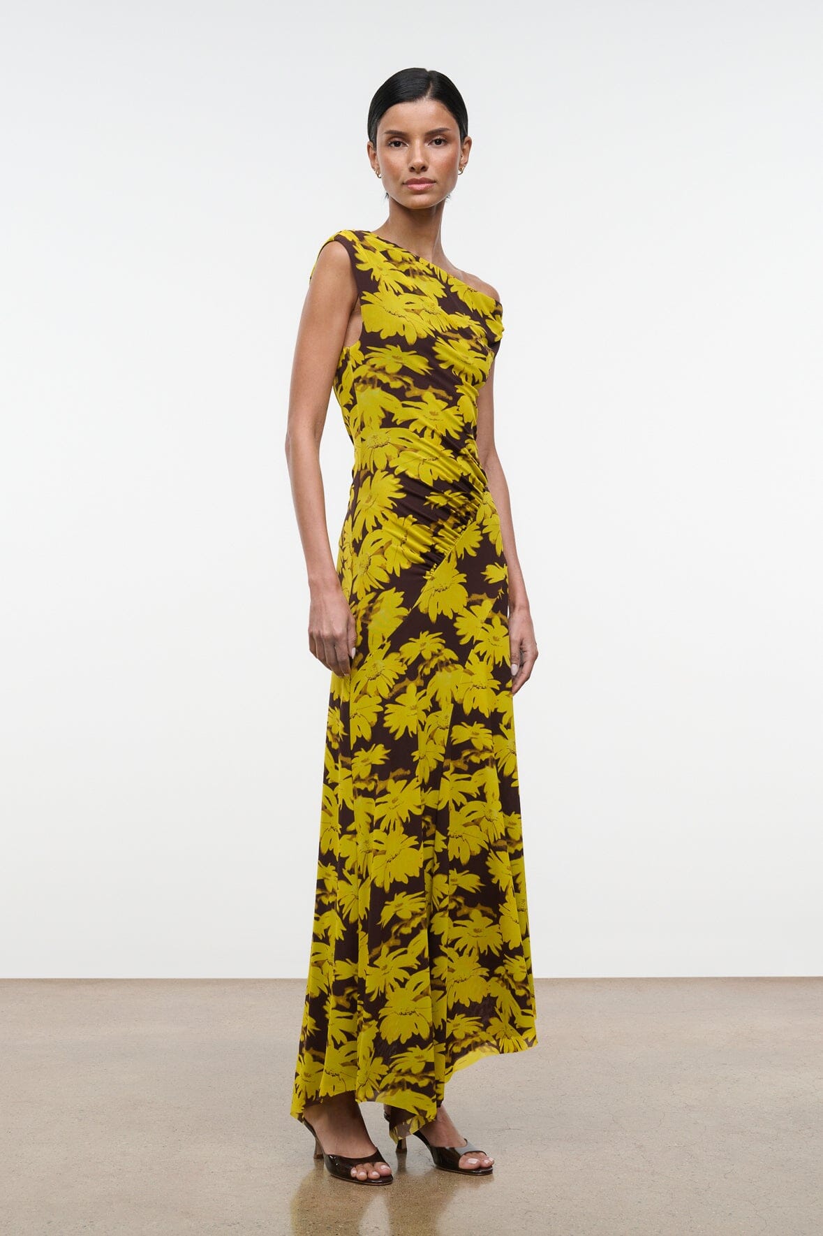 Off-shoulder sleeveless maxi dress with cascading hem and yellow floral print