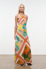 Maxi halter dress with multicolor floral geometric print and side slit at hem