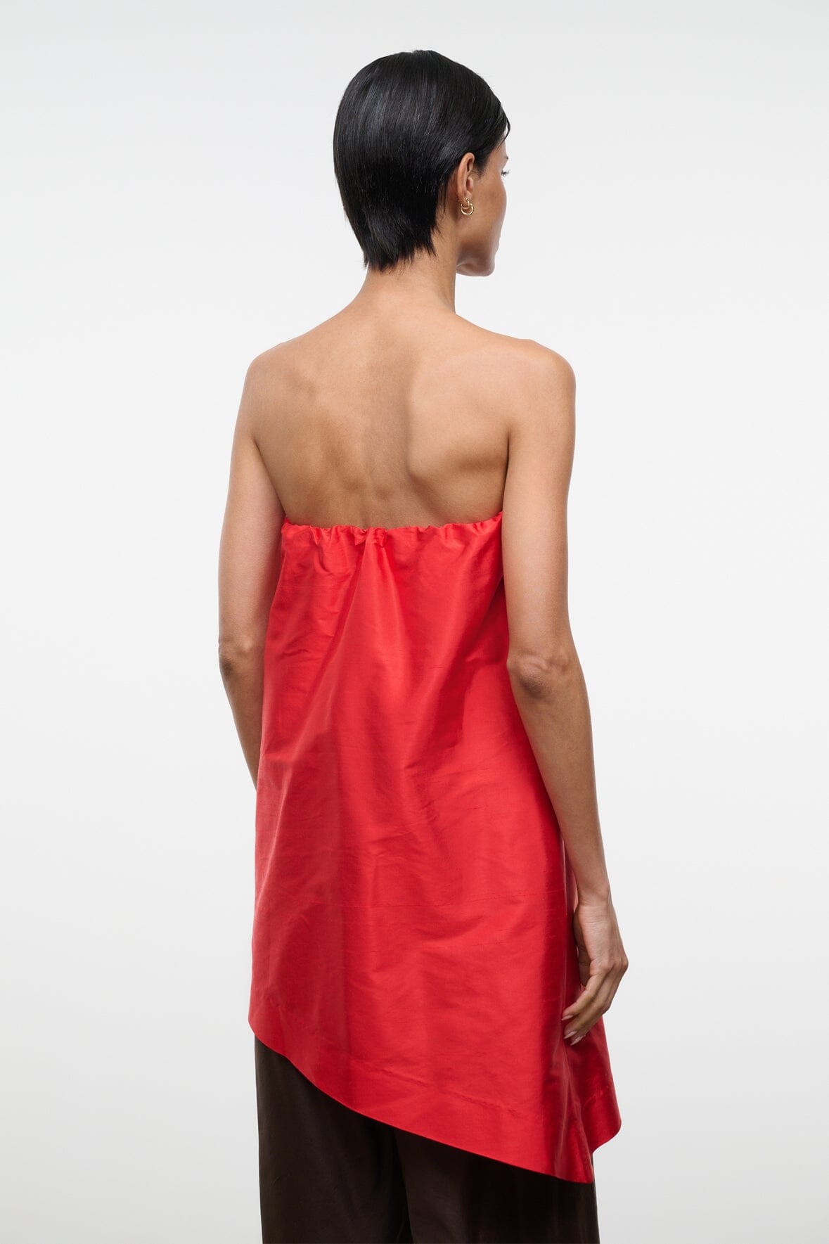 Convertible silk dupioni top back view, strapless red bandeau with asymmetric lower edge