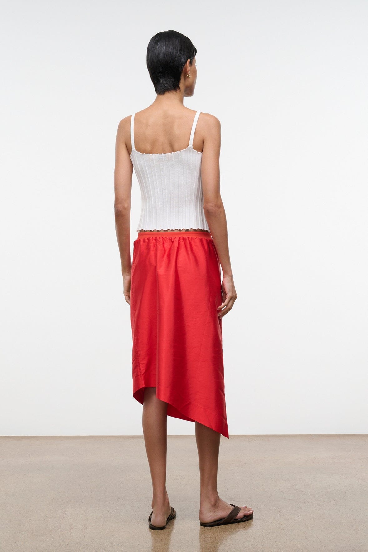 Convertible silk dupioni top back view, red strapless panel with white camisole straps