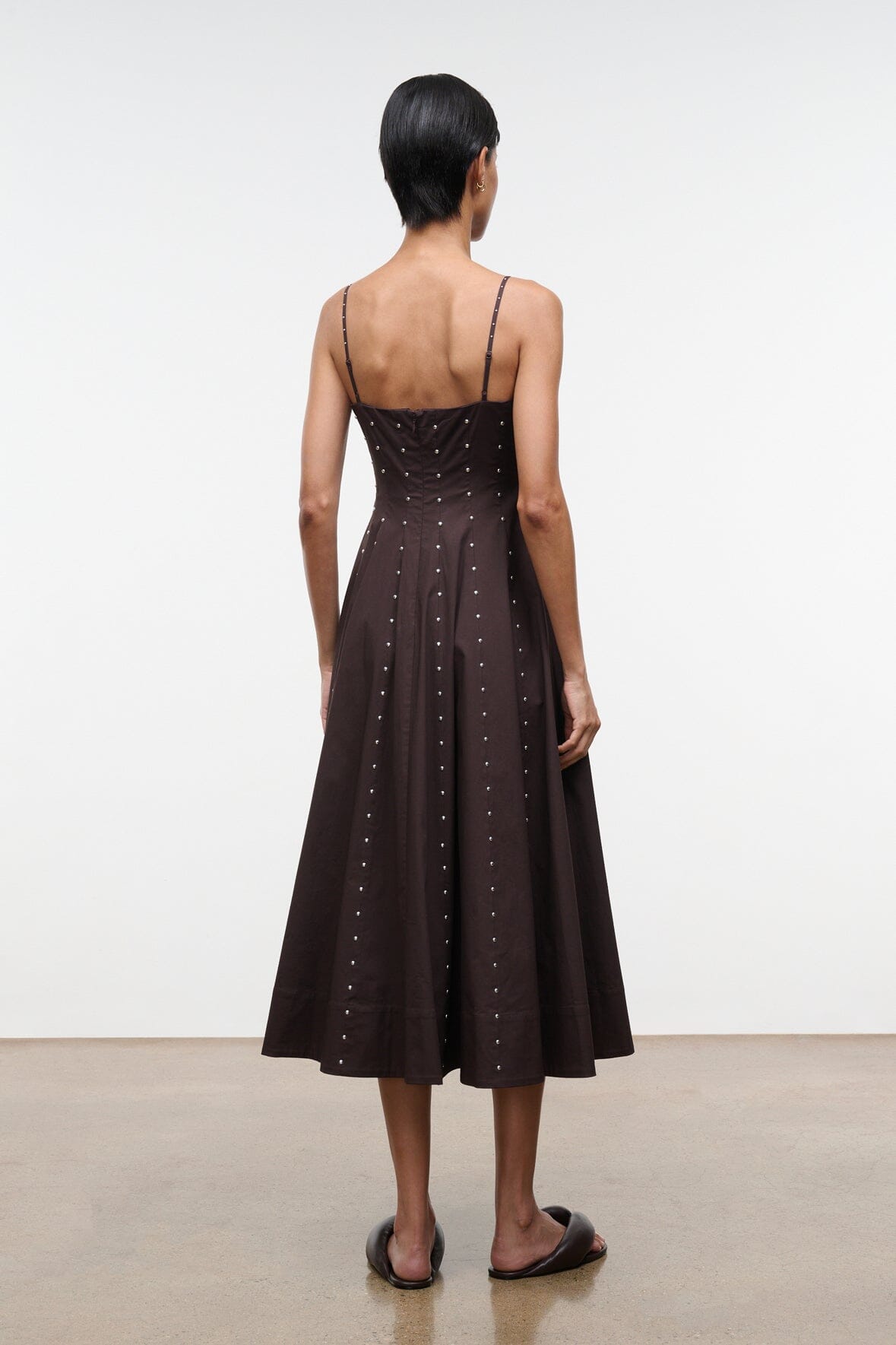 Wylie dress back view with thin straps and stud-stitched center panel
