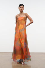 Strapless maxi dress with abstract floral print in orange and teal tones