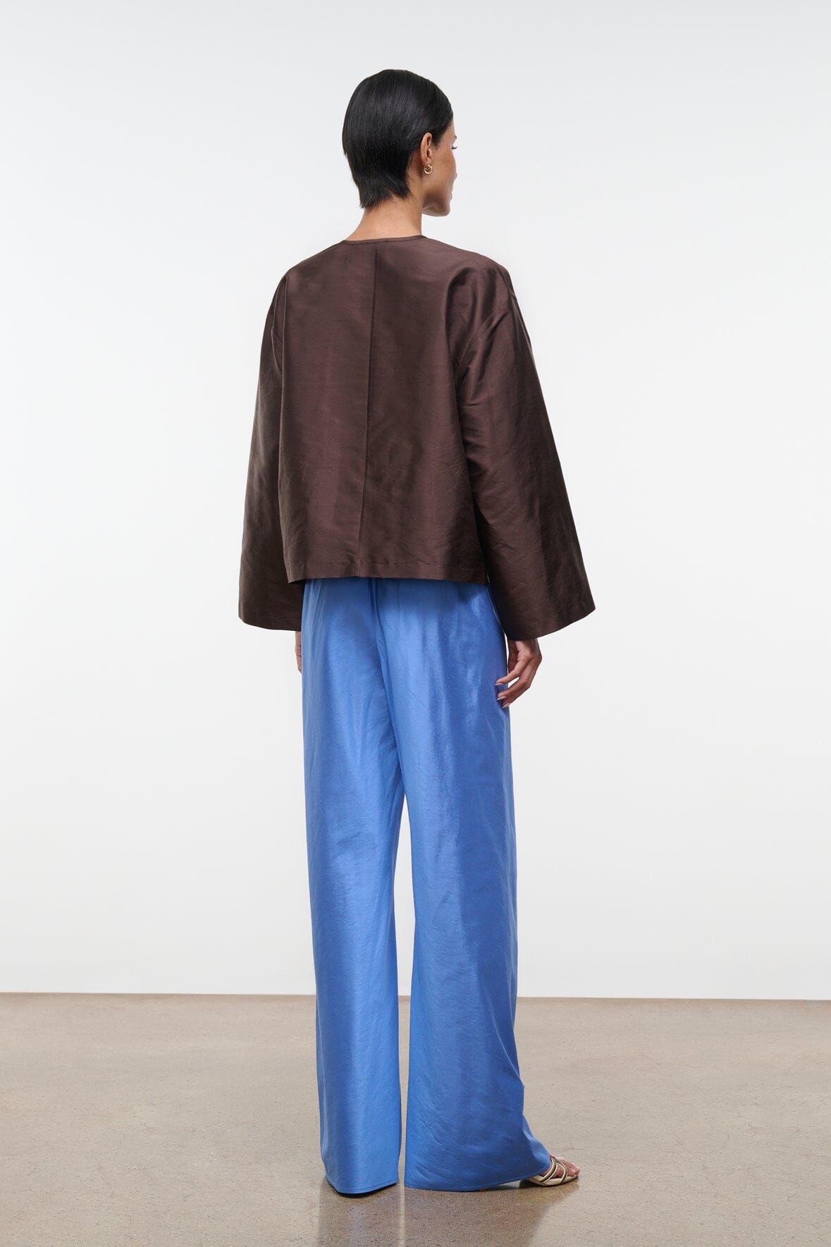 Back view of light blue silk dupioni wide-leg pants, full length