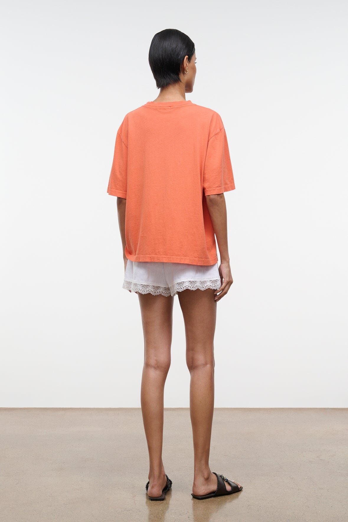 Orange relaxed crew-neck T-shirt, short sleeves, plain back view