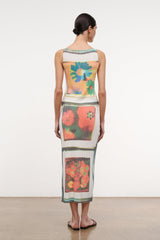 Back view of printed midi skirt with multicolor floral scarf-style panel and teal trim