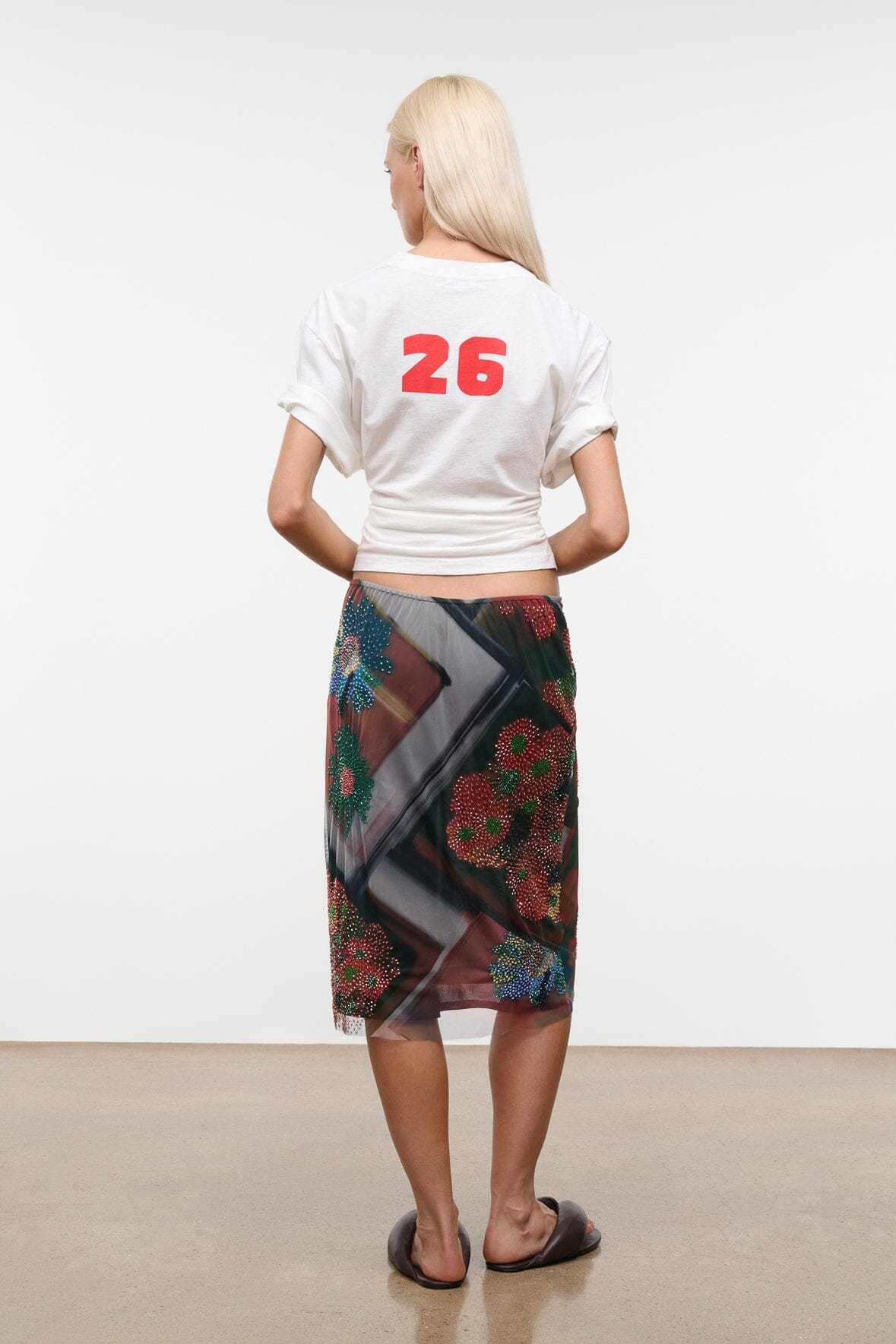 LUCIA skirt back view with tie waist and dark multicolor beaded floral patchwork