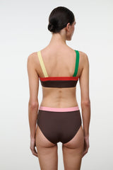 Back of bikini top with dark chocolate bandeau, green and yellow straps, red center accent