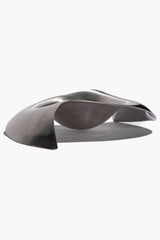 Silver metal ashtray with wide opening and raised center bowl