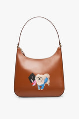 Tan hobo bag with pet photo print of two dogs