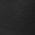 Black leather bag material close-up with fine grain texture