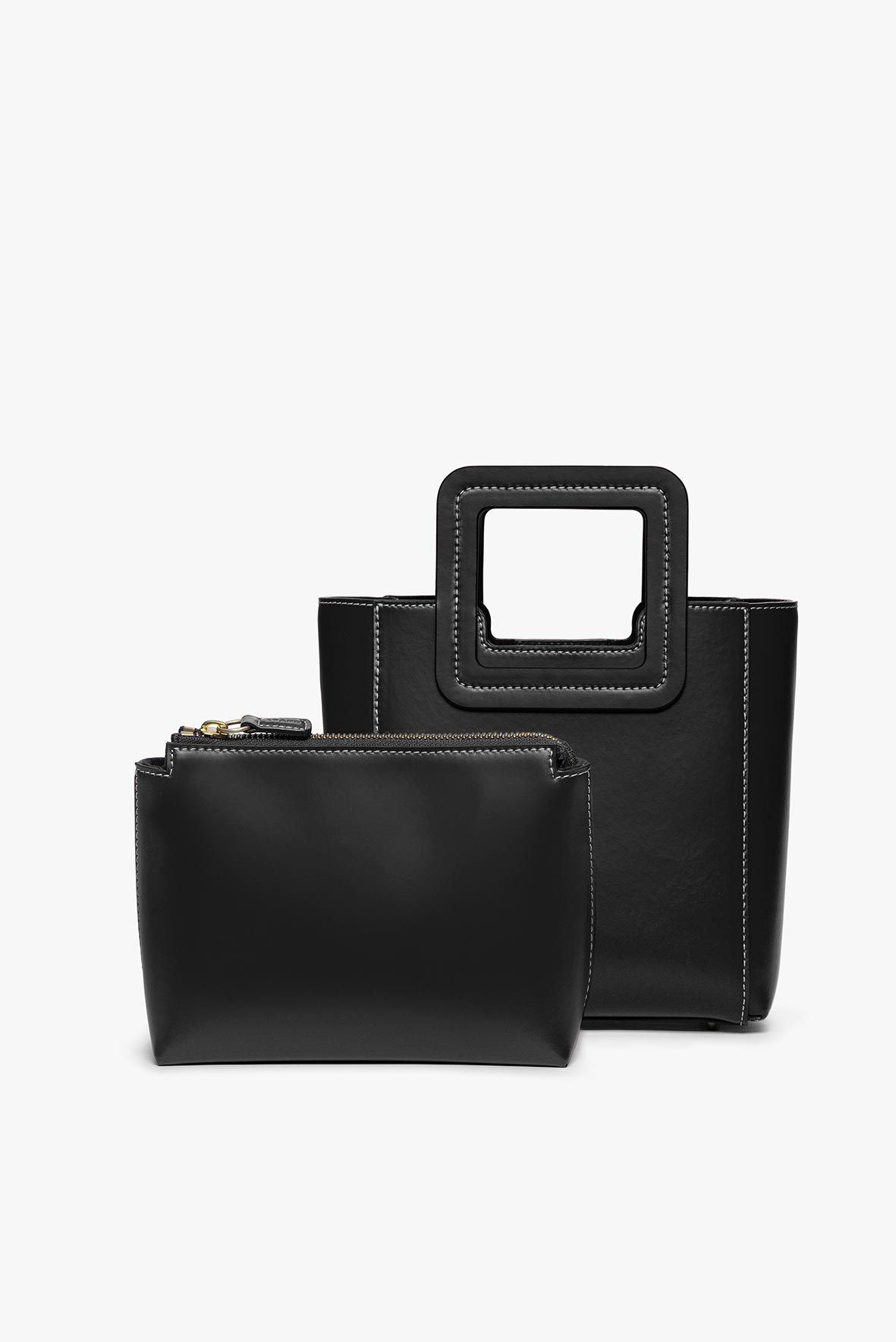 Black leather mini tote with top handle and zippered front pocket