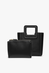 Black leather mini tote with top handle and zippered front pocket