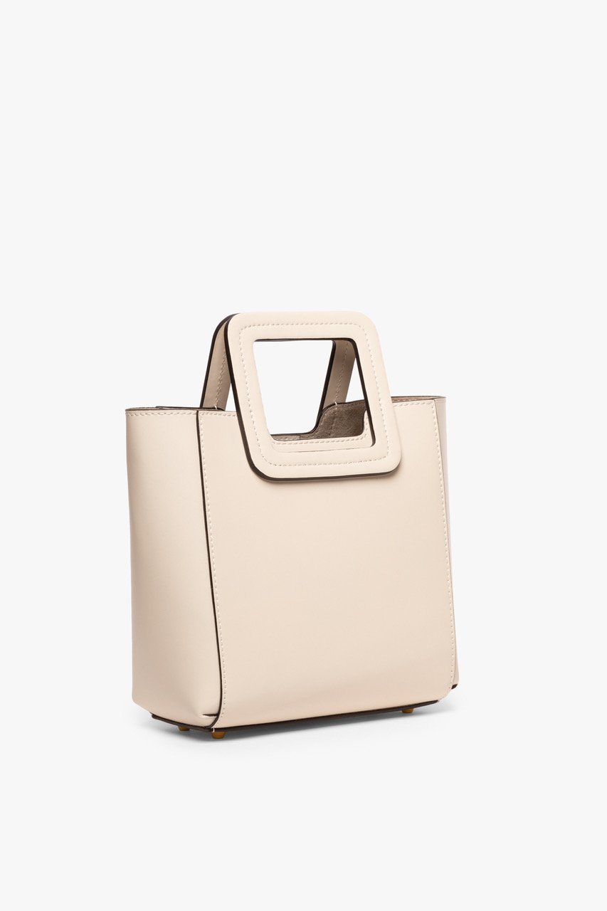 Mini cream leather bag with square top cutout and short handles