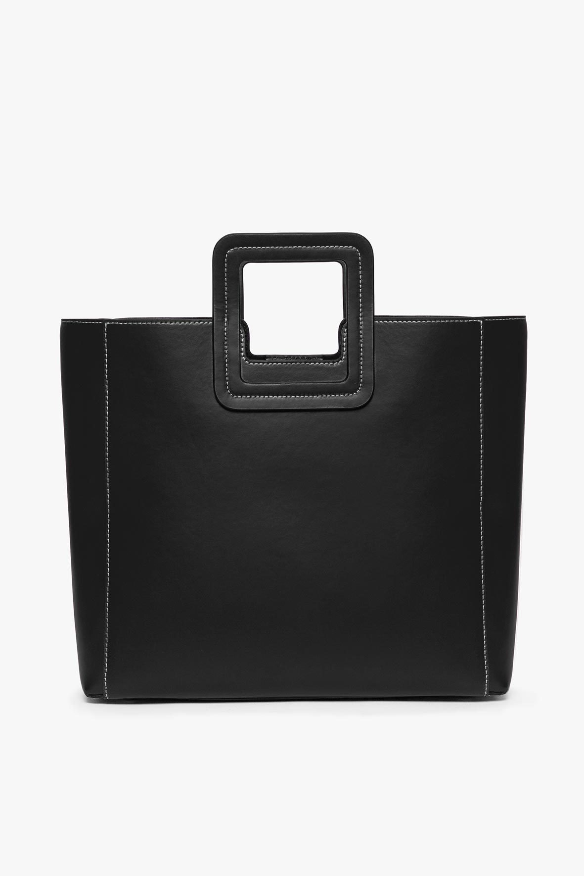 Black leather tote bag with top handle and contrast-stitched loop frame