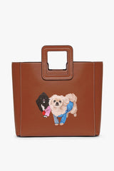 Tan leather handbag with custom pet portrait applique and top handle