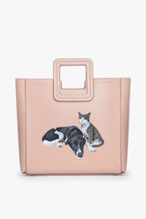 Blush leather tote bag with custom cat and dog pet graphic