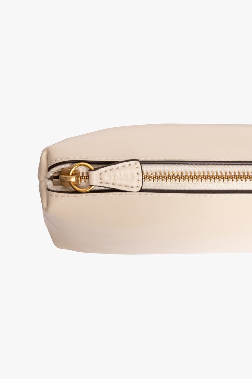 Cream leather bag zipper pocket with gold hardware