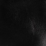 Black leather ankle boot upper texture close-up