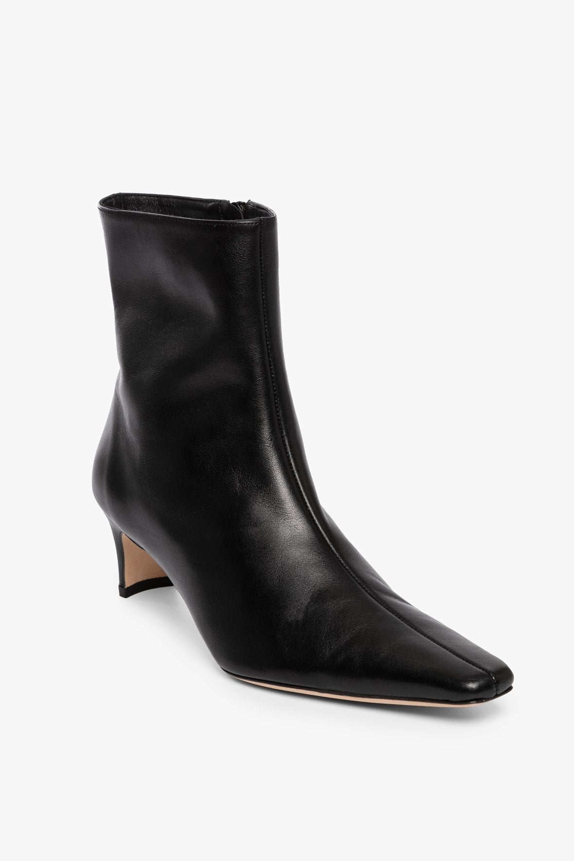 Black ankle boot with pointed toe and slim low heel