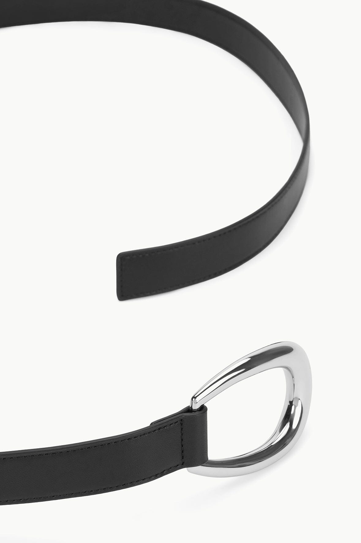 Black wrap belt with silver-tone oval metal buckle and strap end