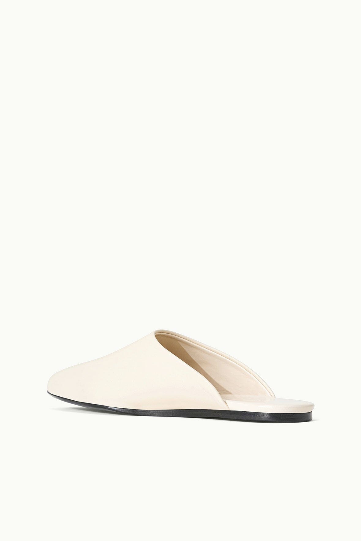 Cream slide slipper with black sole, smooth upper