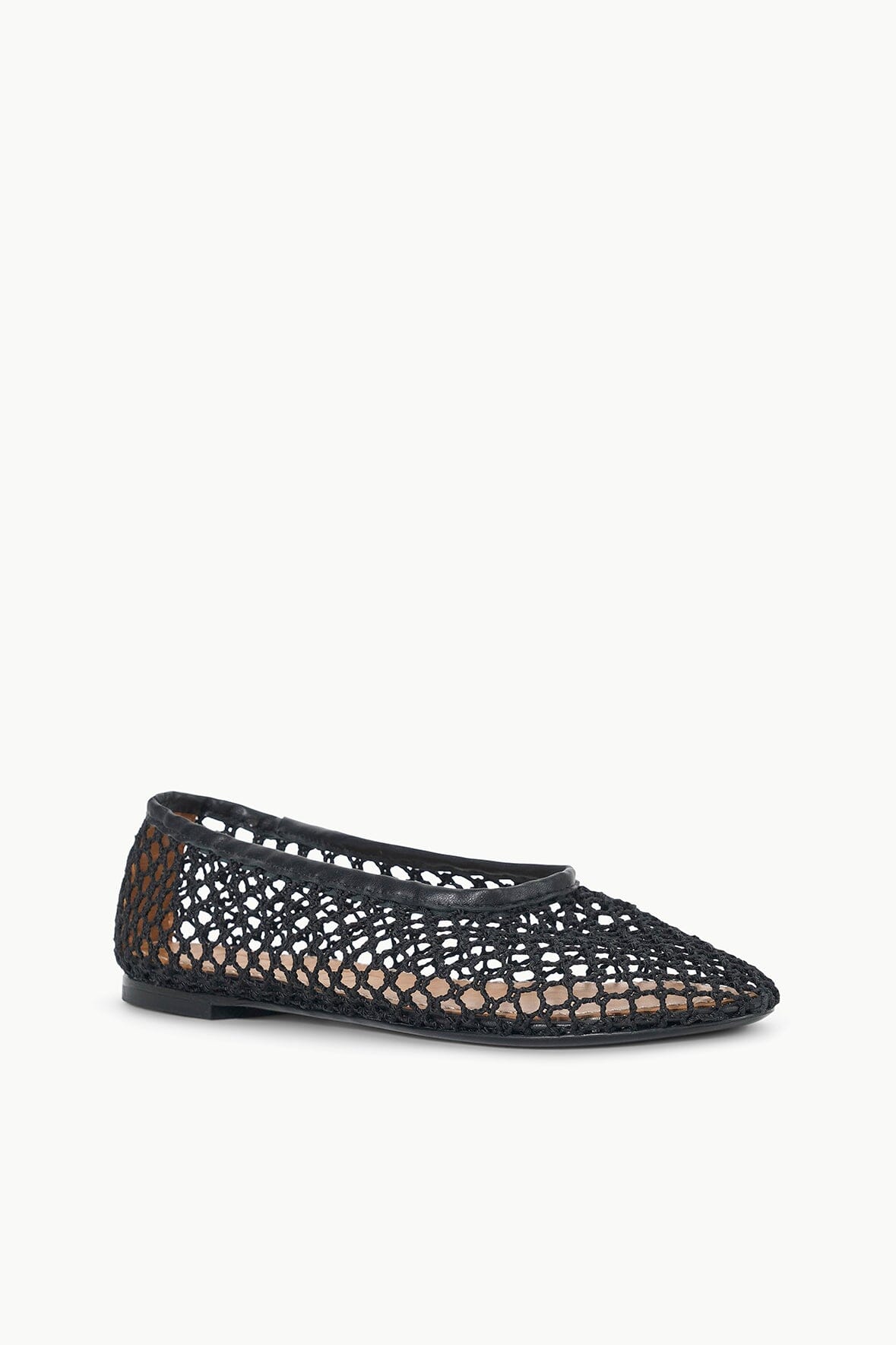 Black mesh ballet flat with round toe opening and flat black sole.