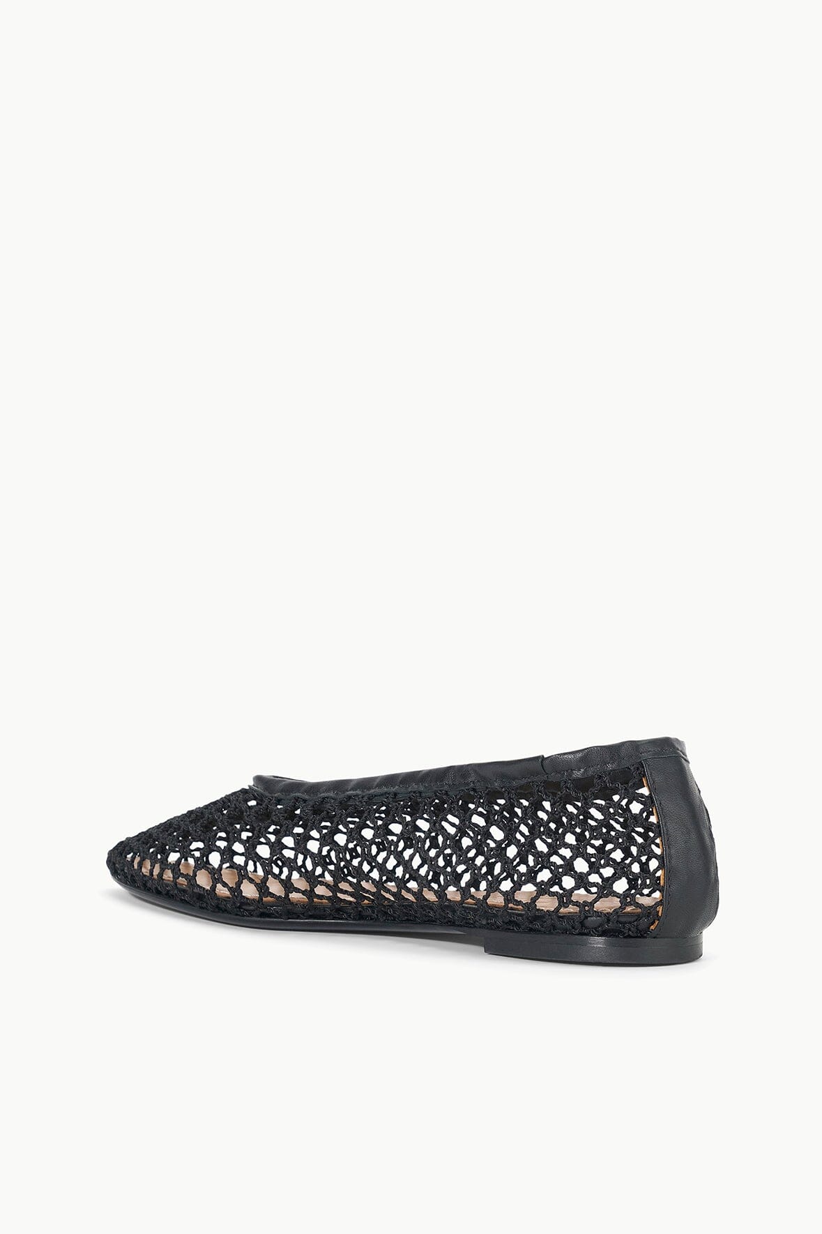 Black netting ballet flat, side angle, low profile with flat black sole.