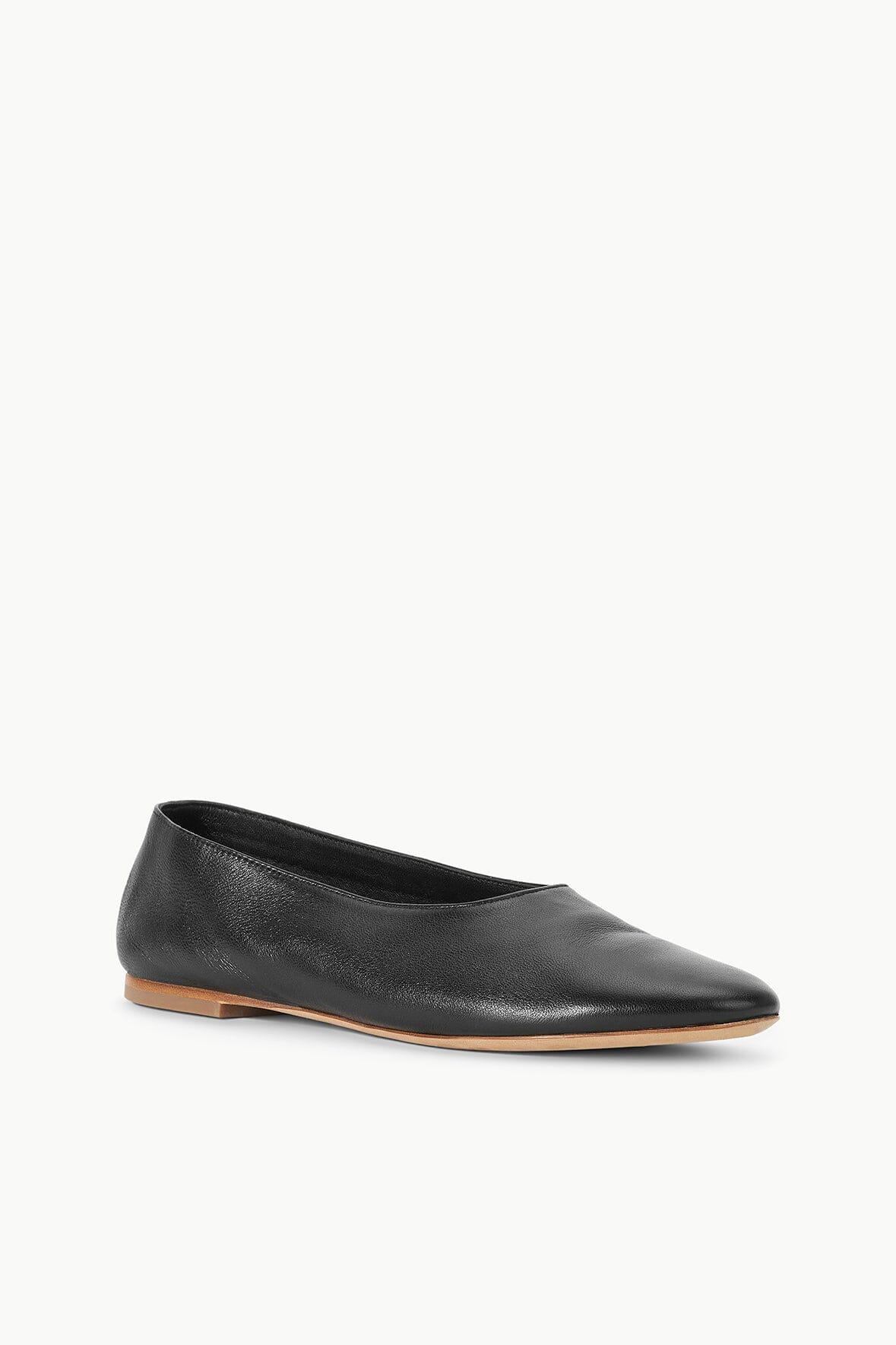 Black ballet flat, low profile slip-on, tan outsole edge