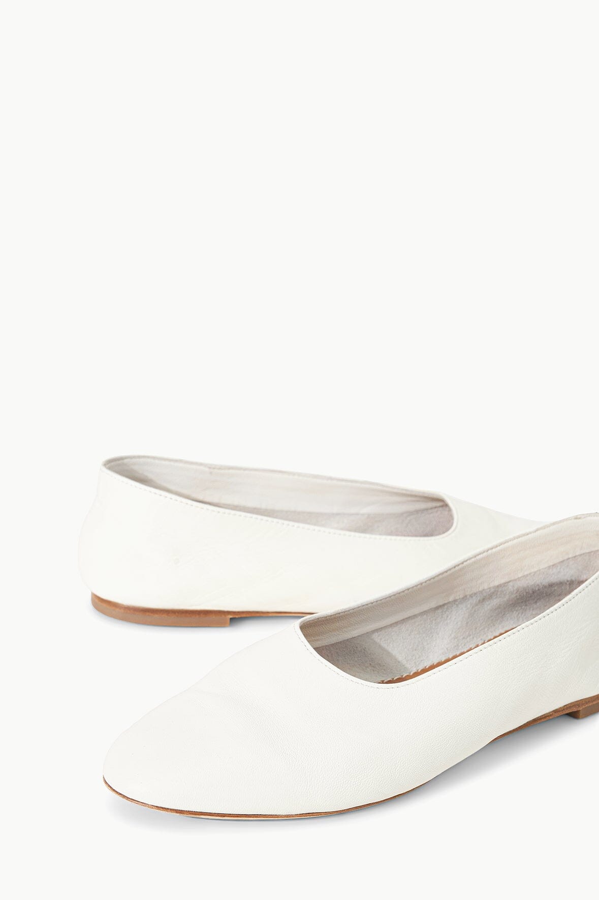 Paper ballet flat close-up with smooth upper and slip-on opening
