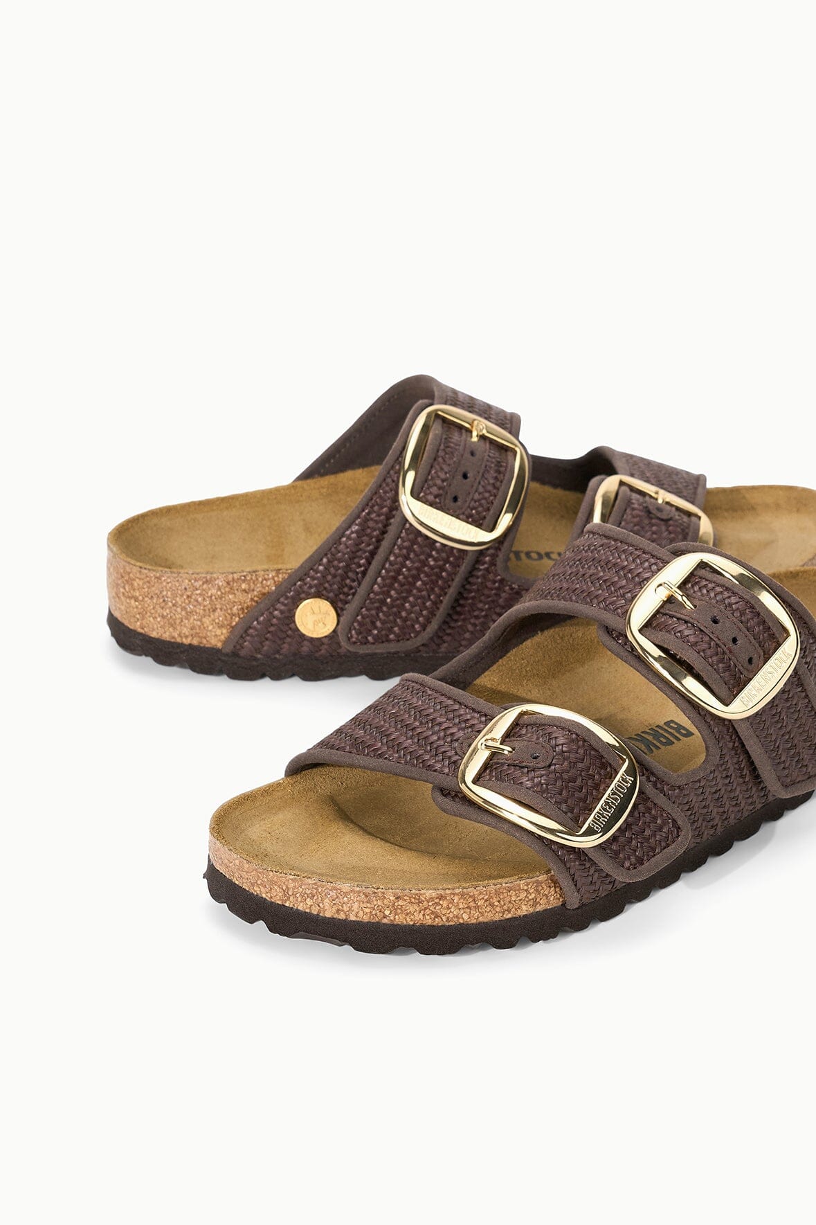 BIRKENSTOCK Arizona slide sandals, pair view, dark raffia upper with silver metal buckles