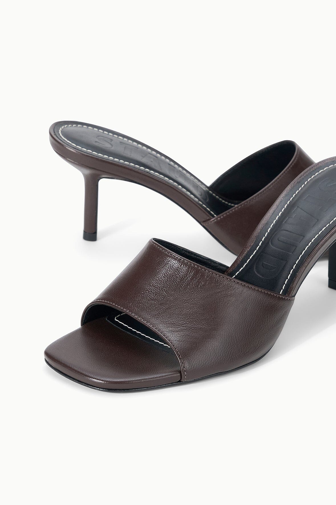 Espresso-brown leather mule with open toe, wide strap detail, block heel