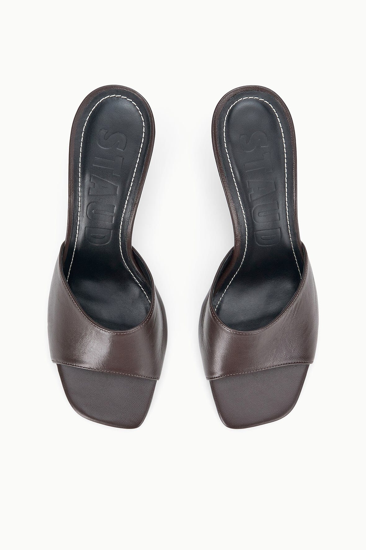 Pair of espresso-brown leather mules with open toe and backless design