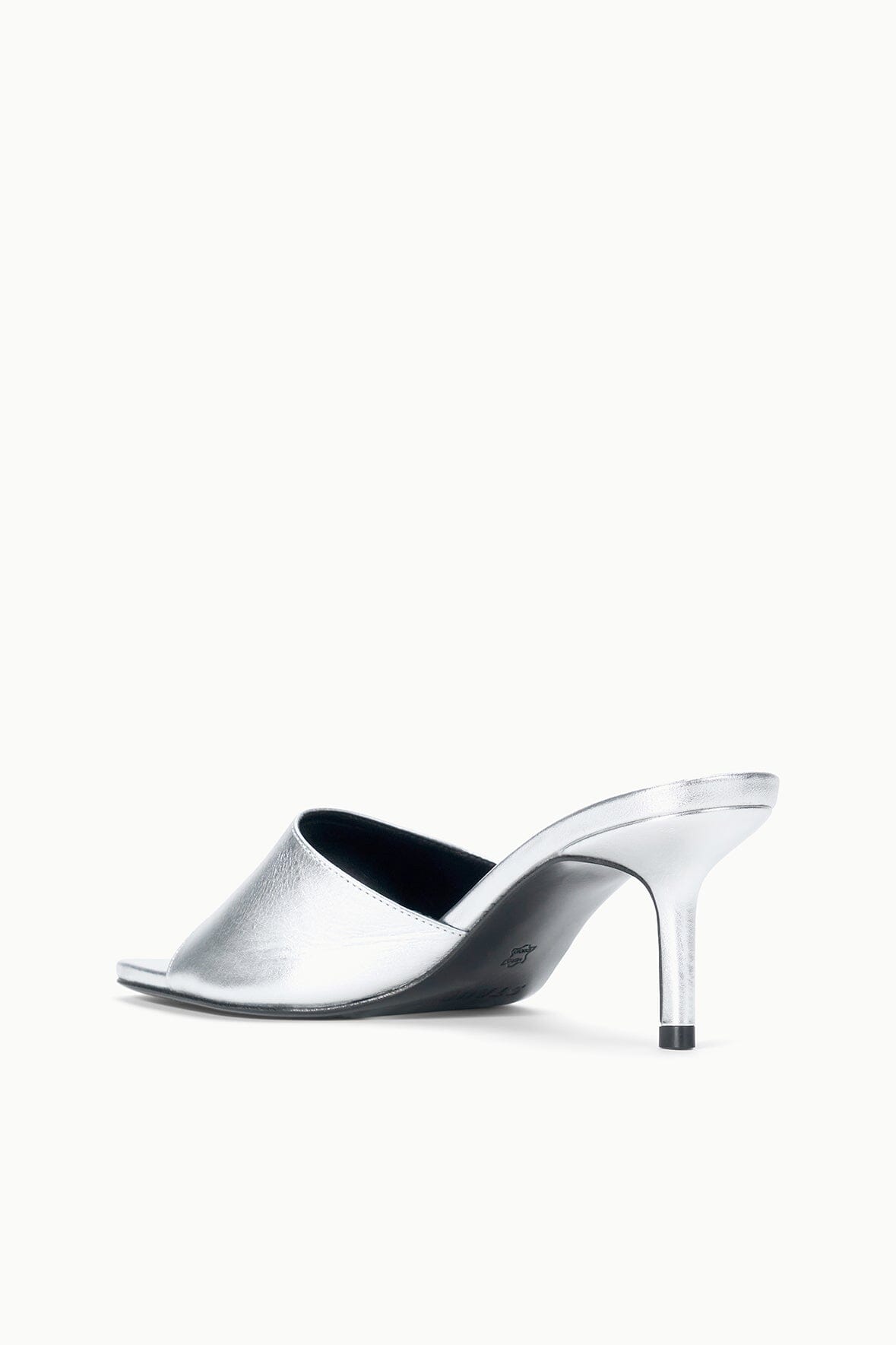 Silver open-toe mule sandal with slim stiletto heel, side angle