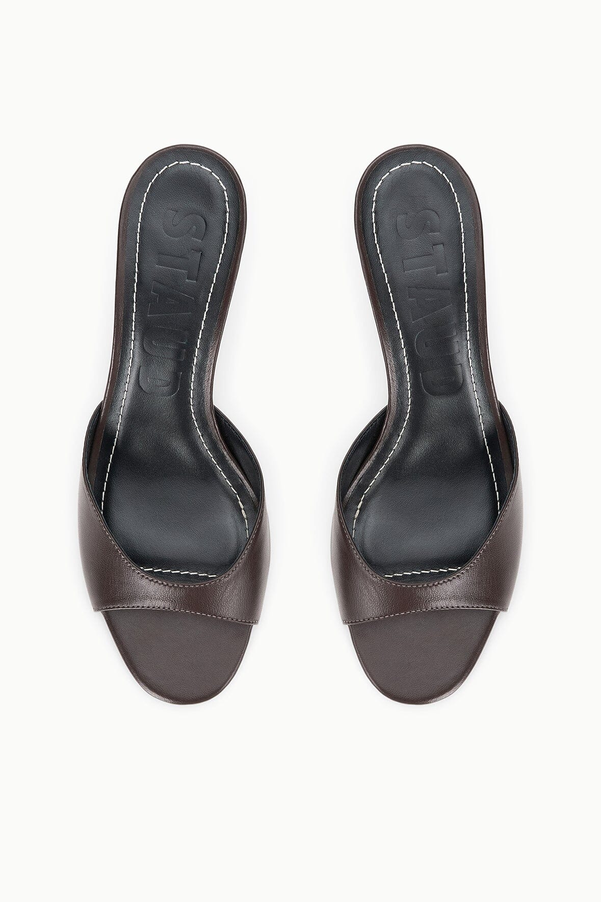 Espresso brown leather mule slides with open toe and low sculpted heel, slip-on style.