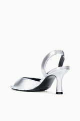 Silver heeled sandal with open toe, curved strap, and slim heel