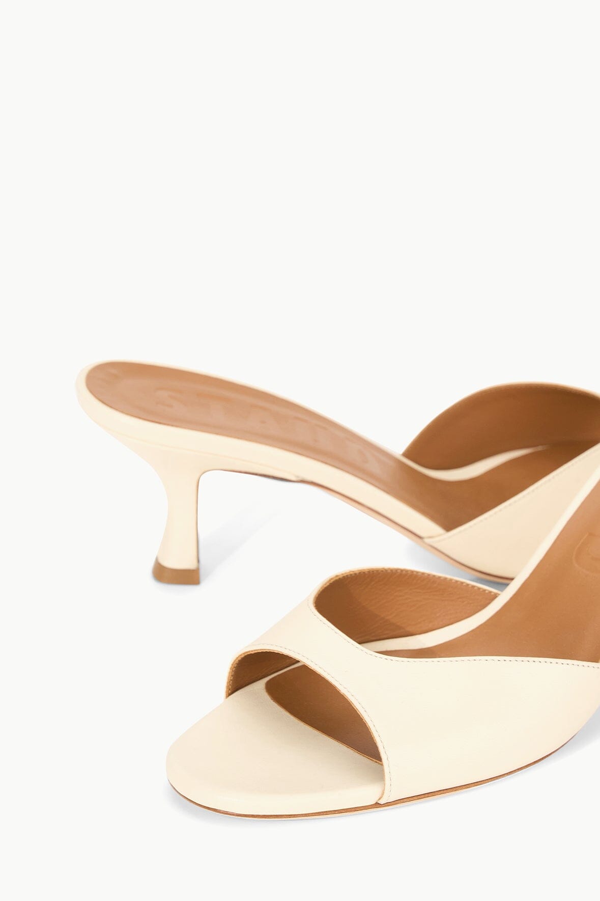 Cream leather mule slide with sculpted low heel