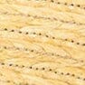 Close-up of natural raffia weave on a mule sandal upper