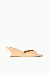 Tan wedge slide sandals with open toe and wide strap