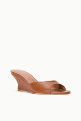 Tan leather wedge mule sandal with thick platform sole and open toe