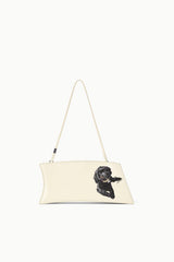 Cream shoulder bag with adjustable strap and black dog portrait